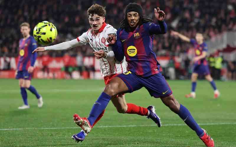 Barcelona title defence dented by Girona derby setback